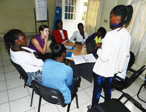 Hellen giving a presentation during training