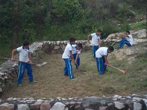 Students clearing the future site of the Lab