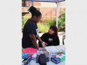Volunteer screening park employee for diabetes