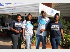 Program coordinator, Tsholopelo, with volunteers