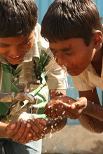Children using the water plant