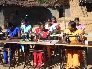 Provide sewing training to 60 women and girls