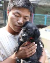 Lucy with one of her dedicated rescuers