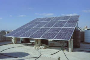 Solar panels power this water purification unit