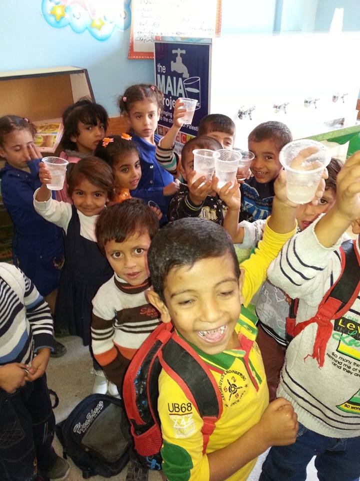 Enjoying clean water at kindergarten!