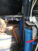 Routine maintenance on one water purification unit