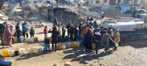 Distributing drinking water for displaced families