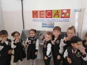 Kindergarteners enjoy drinking safe, clean water!
