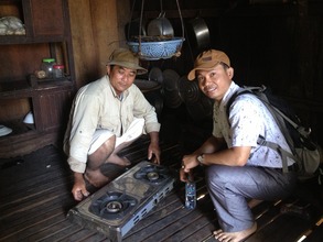 Mr. Sokheng showing his new stove he will install