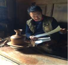 Artisans reading instructions