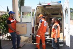Delivering aid to a clinic serving Syrian refugees