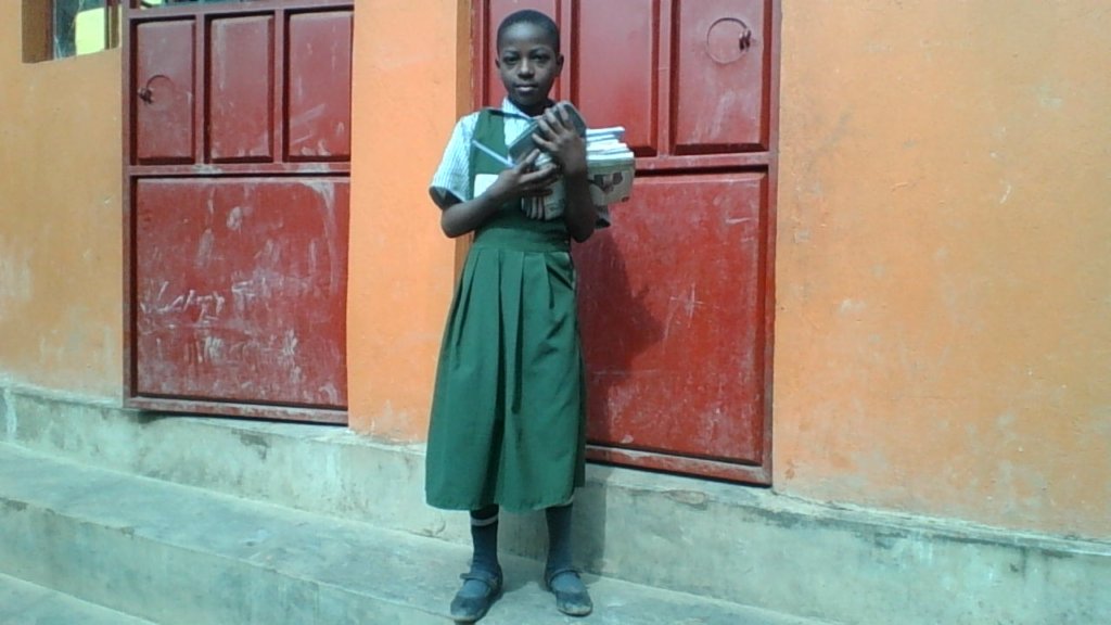 Irene at the door way of her class