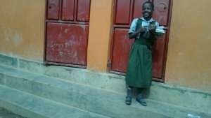 Irene  at her classroom entrance