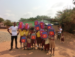 Happy rescued kids in their school uniforms & Bags