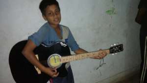 Our music star practising new songs