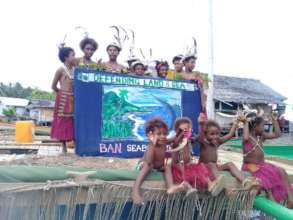Young children express concern for the land & sea