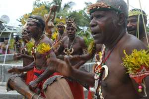 The local community of Riwo welcome delegates