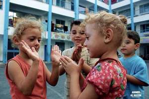 Children taking refuge in UNRWA school in Gaza