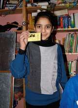 Proud of her library card!