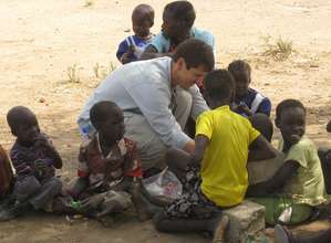 Phillips Bragg with children in South Sudan