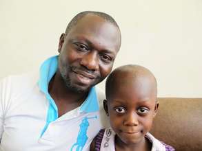 Five-year-old Faustina with her father Eric
