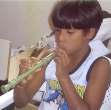 Youngster Practicing His Music