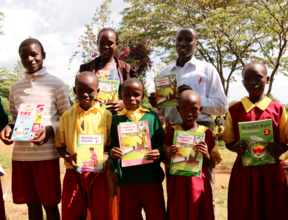 Teachers and students with new books