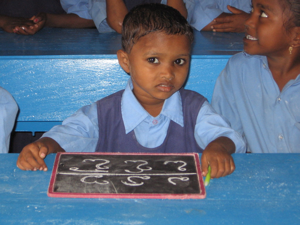 This young girl gets to practice her writing