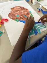 Using paste paper to create a parrot