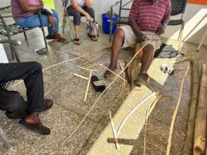 Preparing bamboo strips for basket making