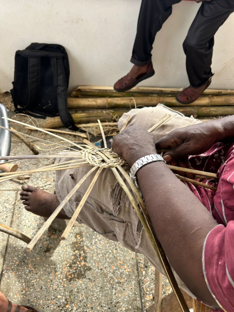 Starting to weave with the bamboo strips