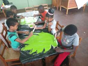 Painting A Breadfruit Tree Leaf For the Mural