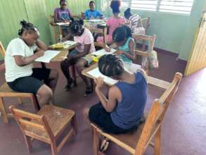 Spring Village Children making book on composting