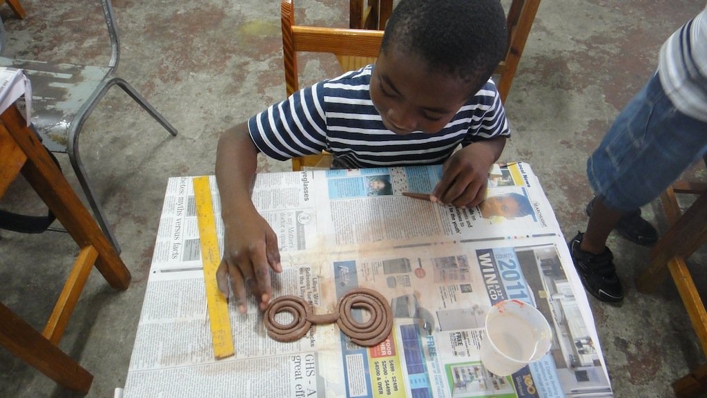 St. Vincent Teaching Art to Children