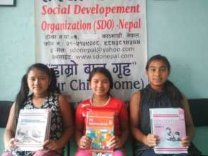 Children happy with new books for new session.