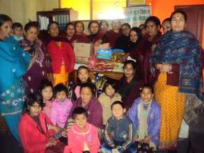 Children happy with CHETANSIL Women Group members.