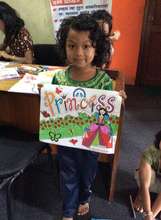 DOLMA, Class-1 happy with her drawings.