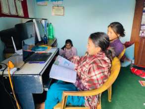 Children attending online classes at child home.