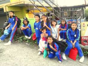 Children are waiting for their school bus.