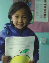 SABITA,Class-Nursery happily showing her art-A+.