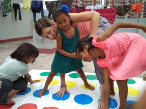 LEILA and children are enjoying on Twister-Game.