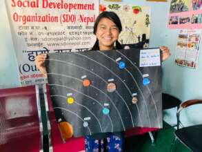 Srijana,class-6 displaying her project work