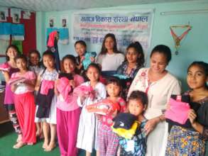 New clothes to children before Dashain festival