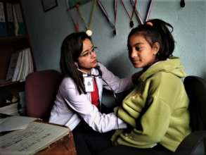 Dr. Swekchha on regular health checkup to children