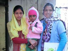 Health Promoter Veena with Janvi and her mother