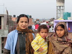 Health Promoter Sushma with Samir and his mother