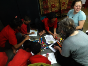 Udaan beneficiaries engaged in drawing activity.