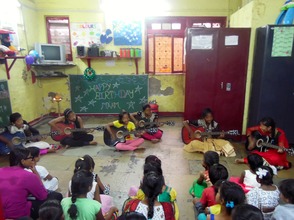 Playing the guitar at the Udaan Felicitation!