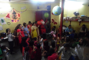 Girls cheer as Santa comes during Christmas party!