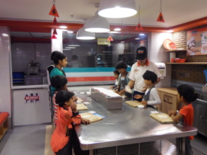 Making mouth-watering pizzas at KidZania!